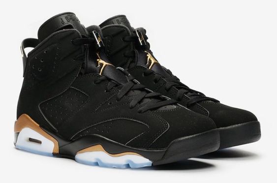 jordan negras y doradas